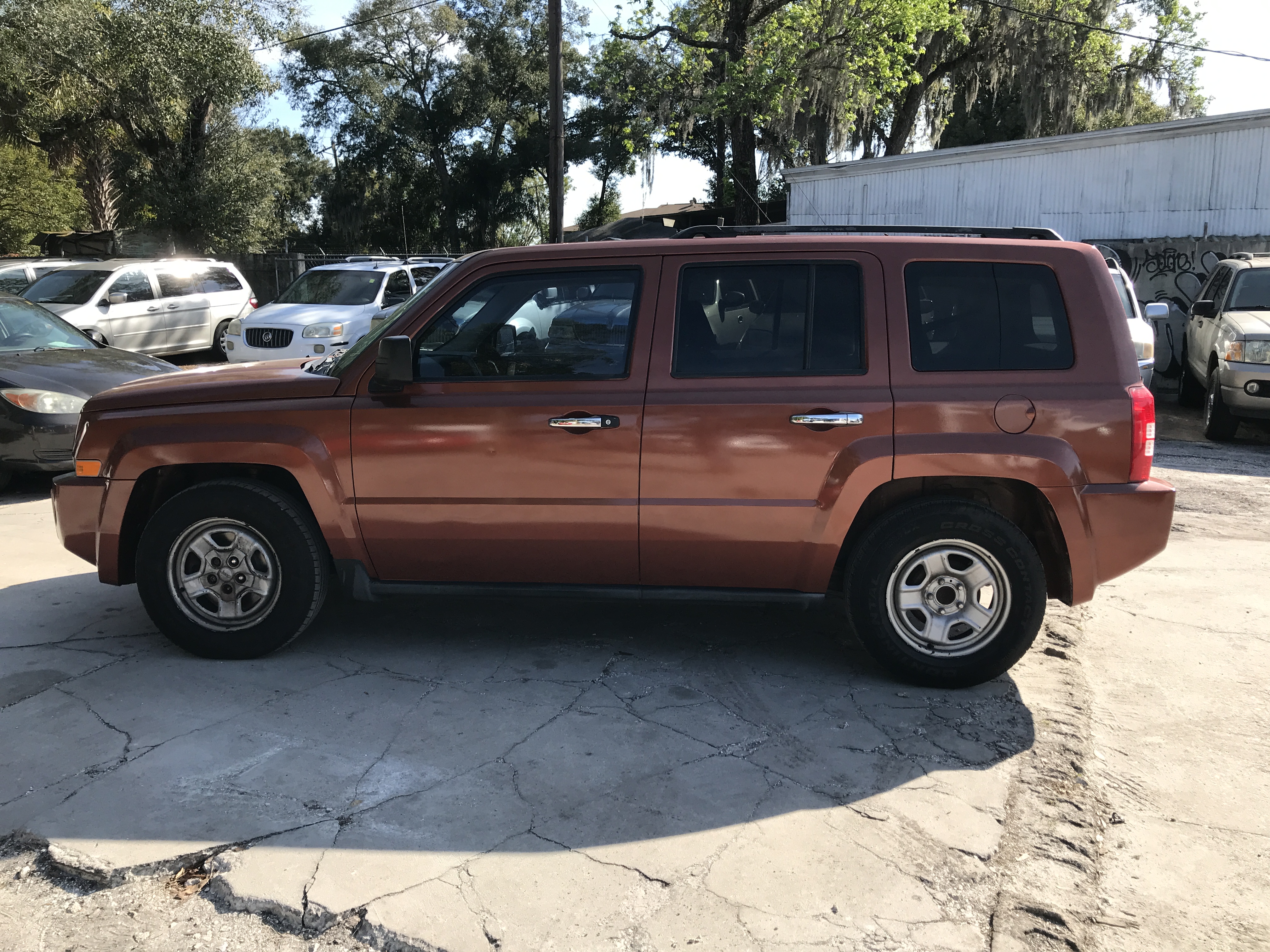 2008 Orange Jeep Patriot Auto Fever